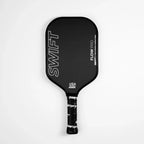 A black Swift Flow Pro pickleball paddle with white text.